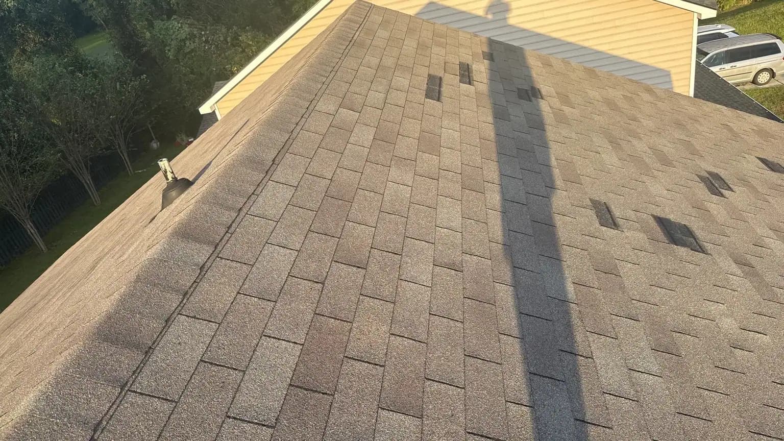 Architectural shingle roof in Richmond Hill, Georgia, being evaluated for wind-related installation details