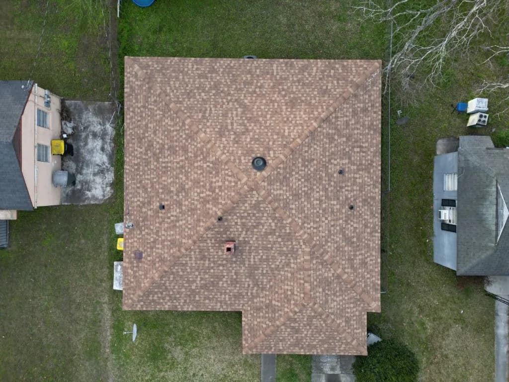 Aerial view of completed roof replacement with premium shingles in Savannah GA