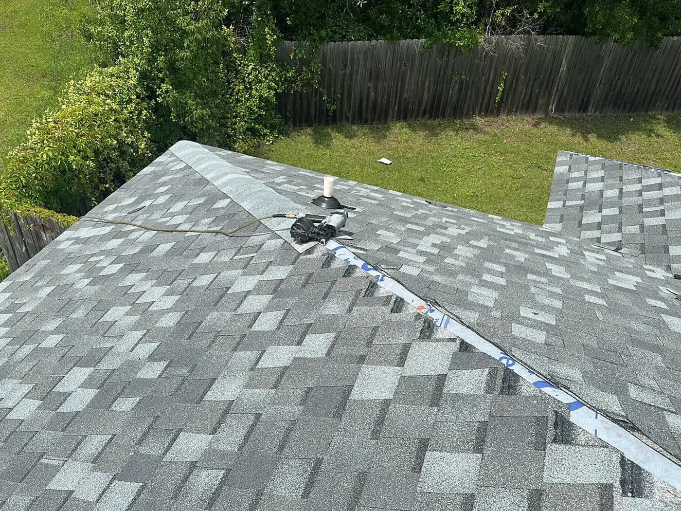 Coastal Granite architectural shingles being installed on the Hinesville home.