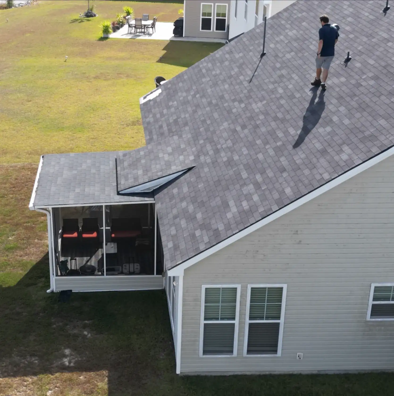 Professional roof inspection for storm damage repair on Owens Corning Oakridge shingle roof in Pooler Georgia