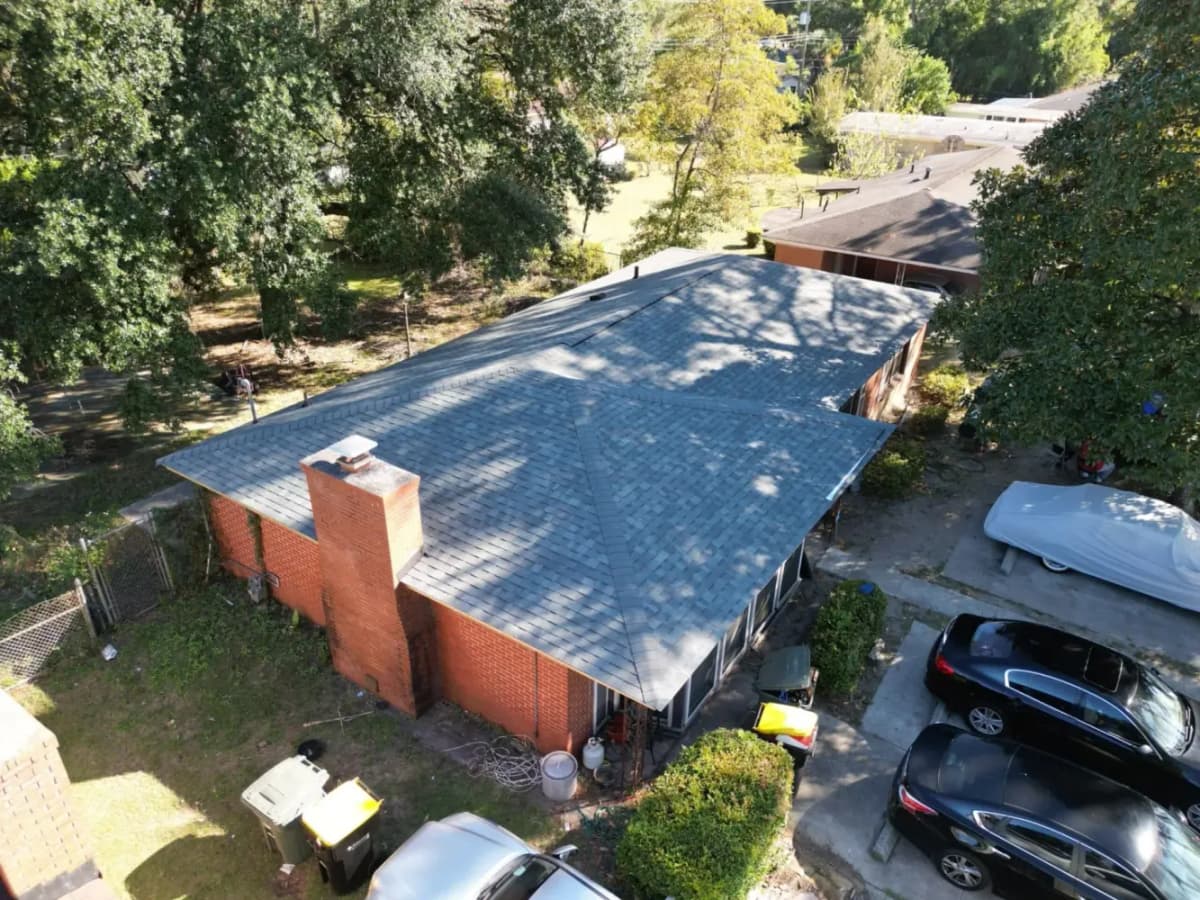 Complete roof renovation with Owens Corning Oakridge Estate Gray shingles on modern home in Sylvan Terrace Savannah Georgia