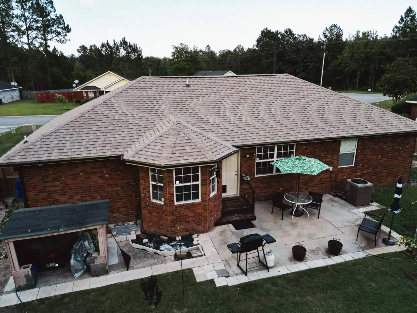 Coastal Georgia residential roof replacement with Atlas Pinnacle Pristine Tan Mist architectural shingles in Hinesville GA
